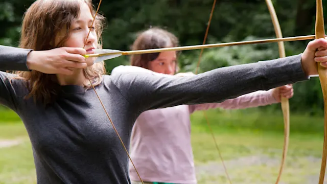 Campers at the archery range on a no-school day
