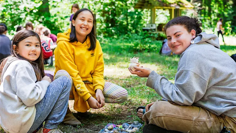 Kids trading handmade treasures at the Goblin Market barter fair